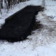 Illustration for article titled Why do Russians pour asphalt over snowed roads instead of plowing them?